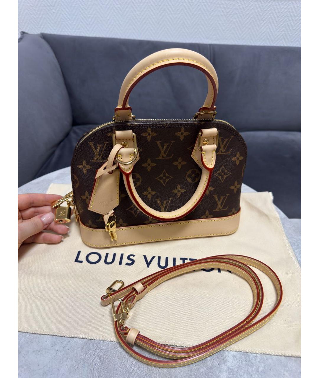 LOUIS VUITTON Коричневая кожаная сумка с короткими ручками, фото 6