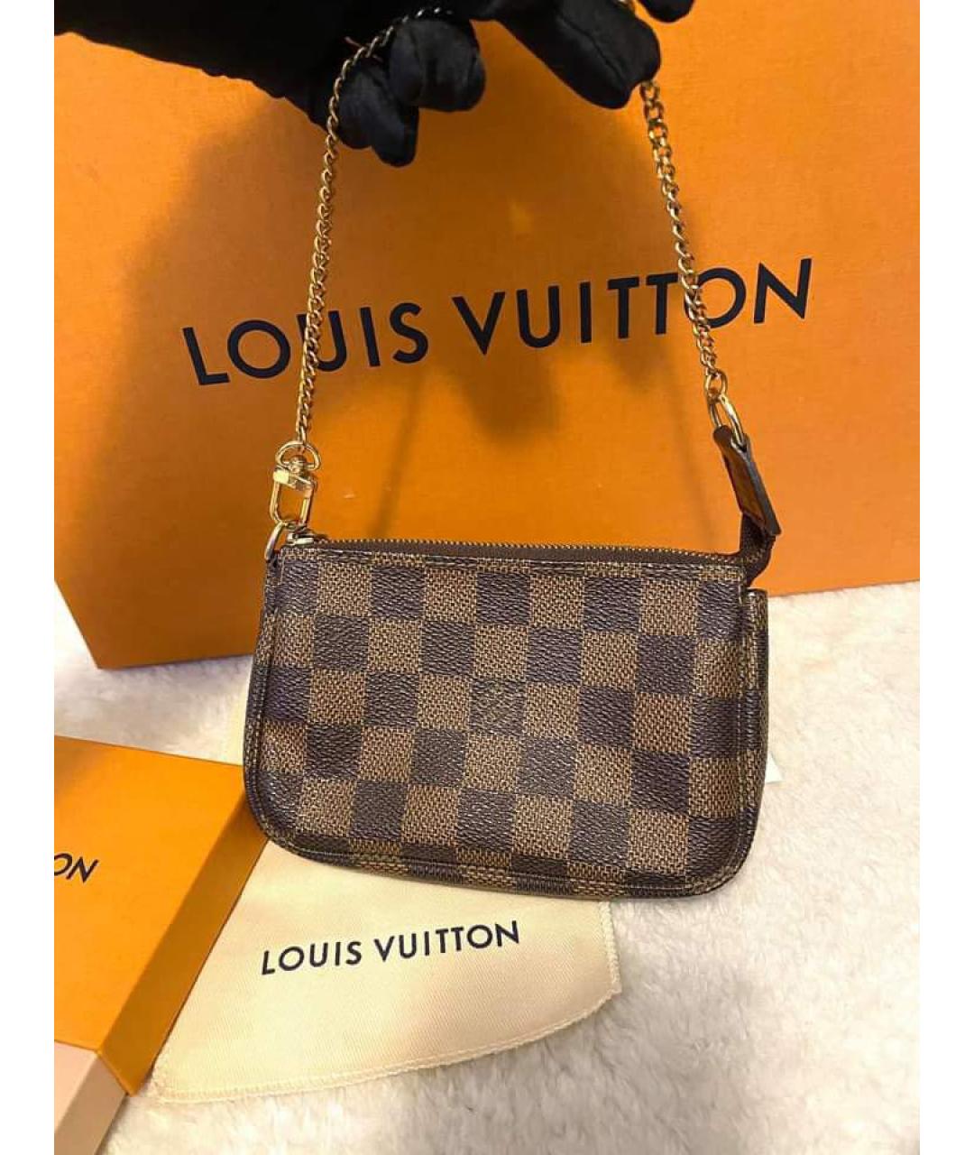 LOUIS VUITTON Коричневая кожаная сумка с короткими ручками, фото 3