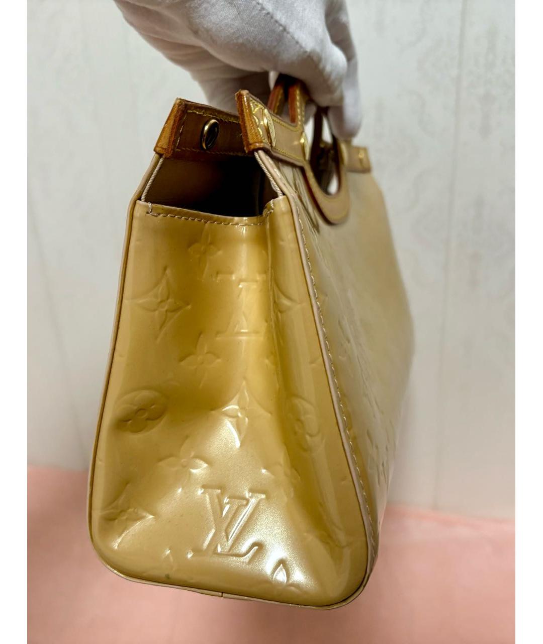 LOUIS VUITTON Золотая сумка с короткими ручками из лакированной кожи, фото 5