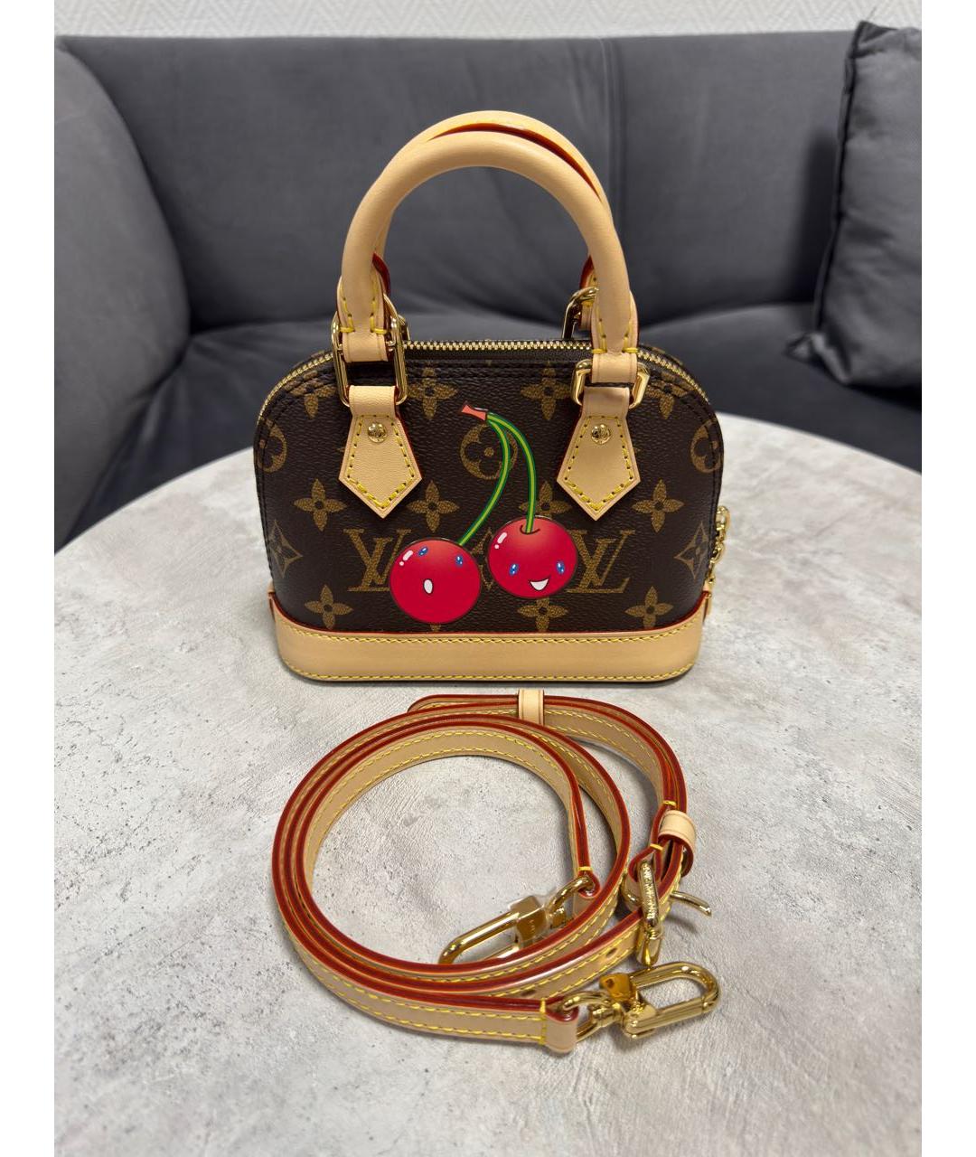 LOUIS VUITTON Коричневая кожаная сумка с короткими ручками, фото 6