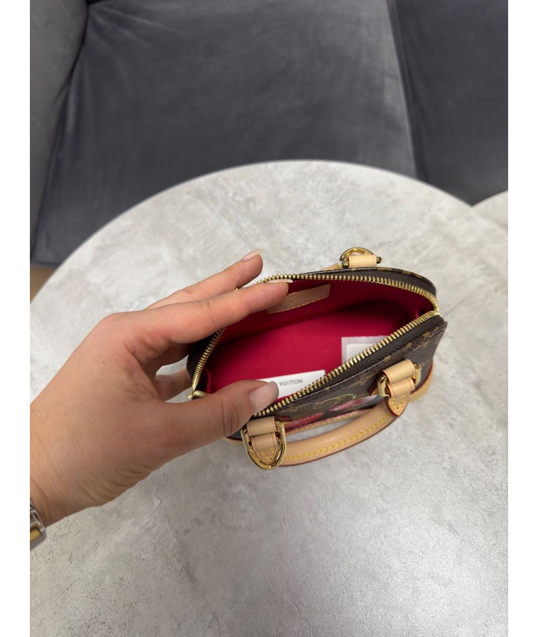 LOUIS VUITTON Коричневая кожаная сумка с короткими ручками, фото 4