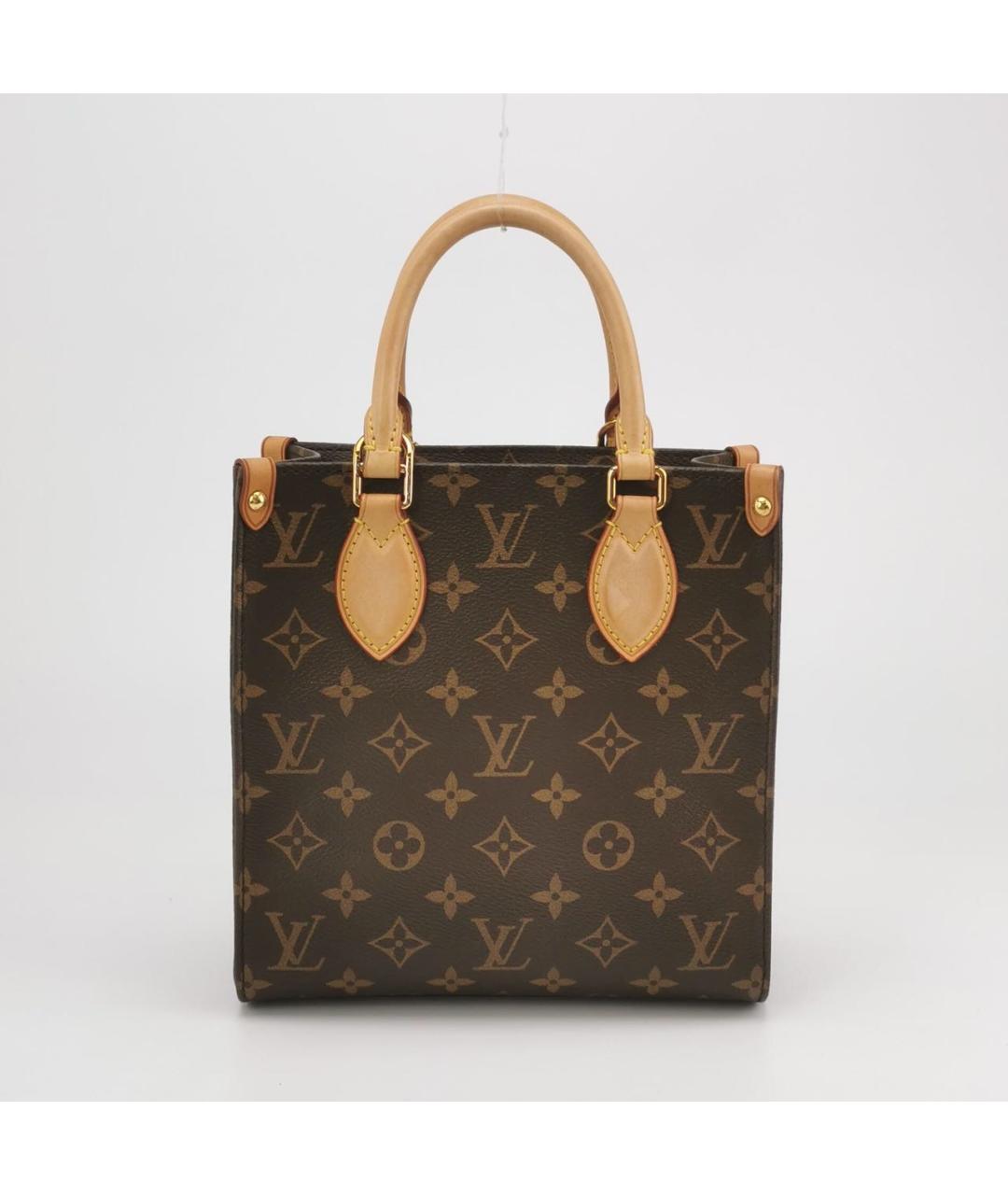 LOUIS VUITTON Коричневая кожаная сумка с короткими ручками, фото 4