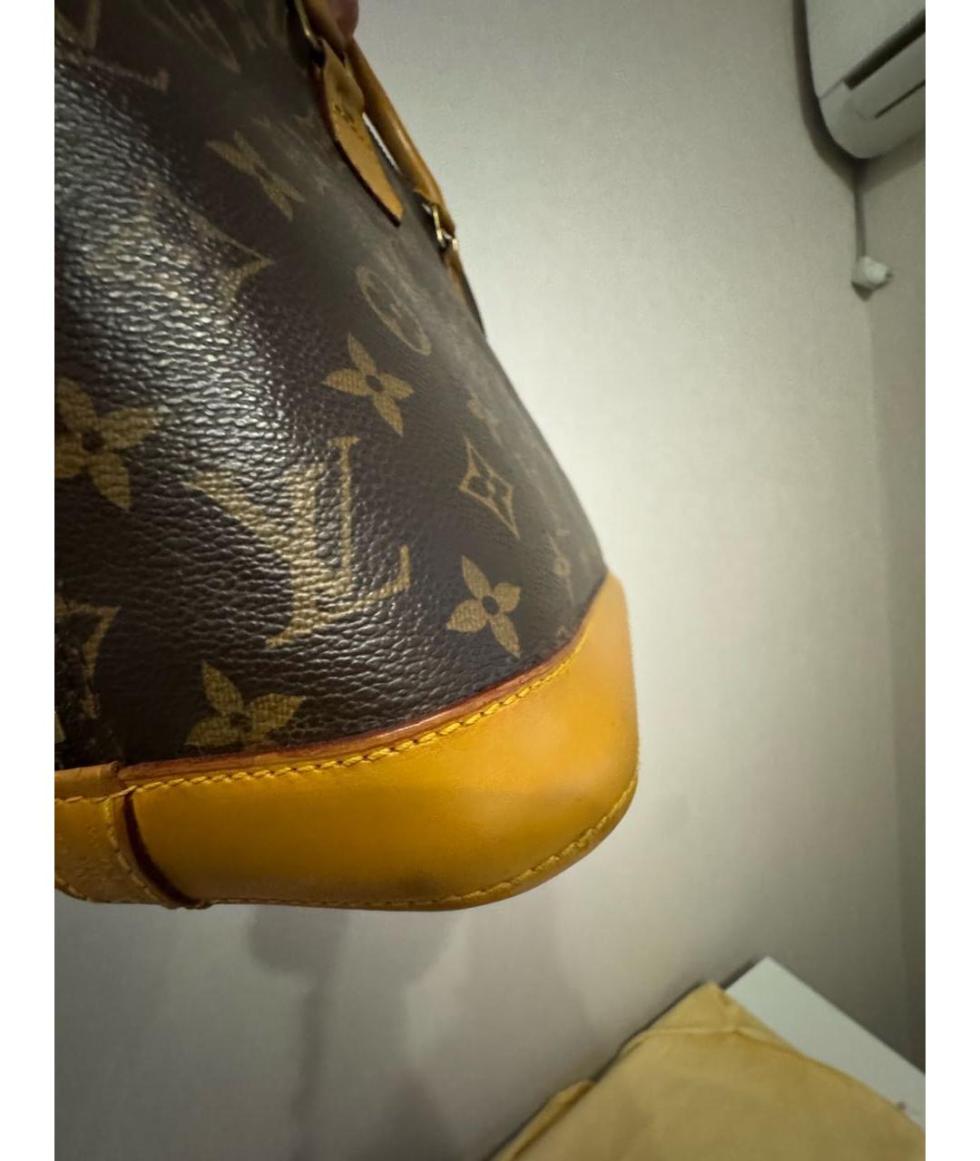 LOUIS VUITTON Коричневая кожаная сумка с короткими ручками, фото 6