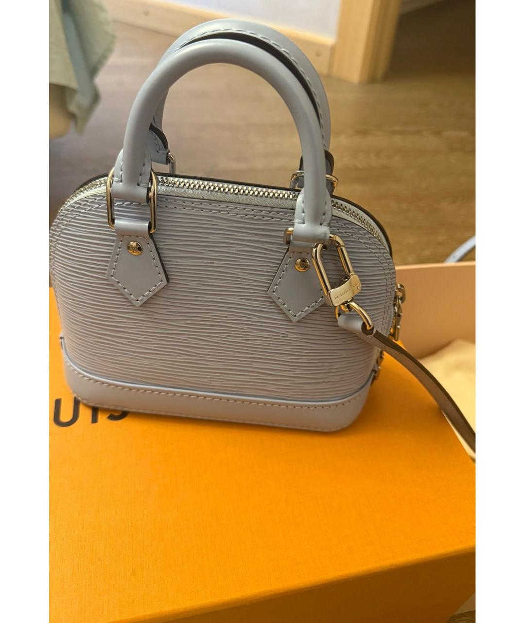 LOUIS VUITTON Голубая кожаная сумка с короткими ручками, фото 5