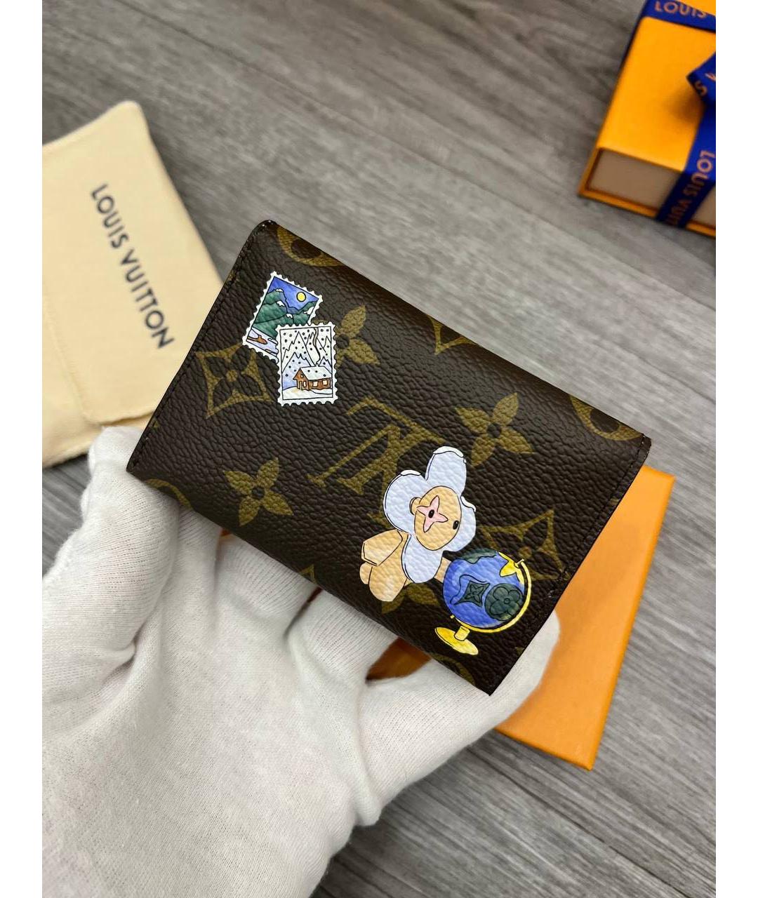 LOUIS VUITTON Коричневый кожаный кошелек, фото 2