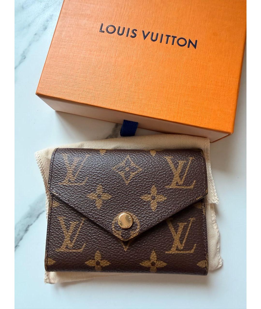 LOUIS VUITTON Коричневый кожаный кошелек, фото 5