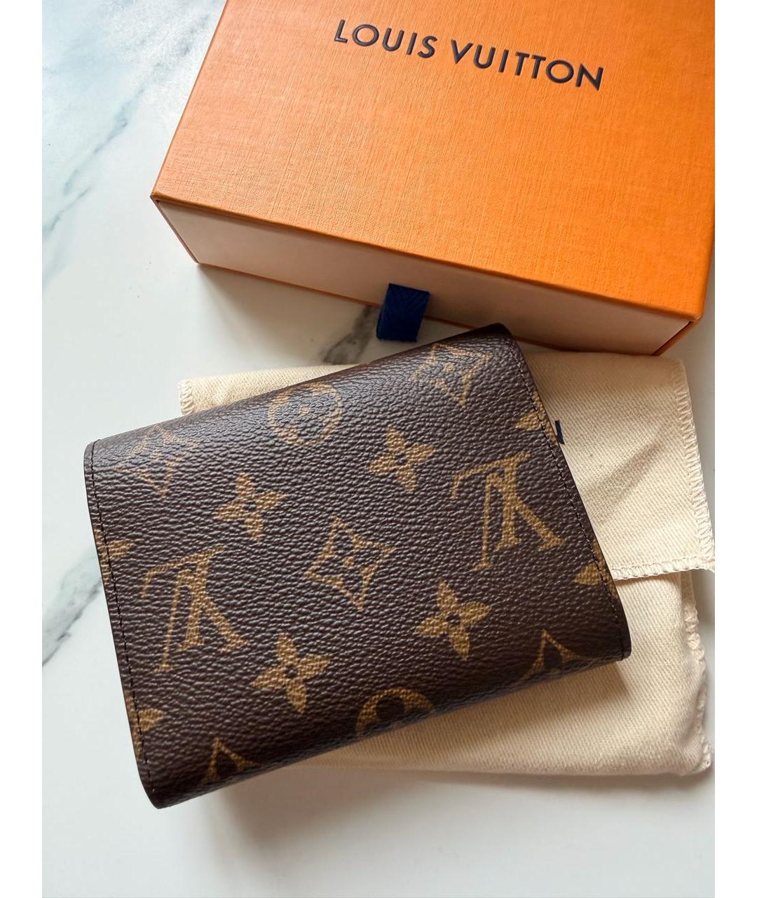 LOUIS VUITTON Коричневый кожаный кошелек, фото 3