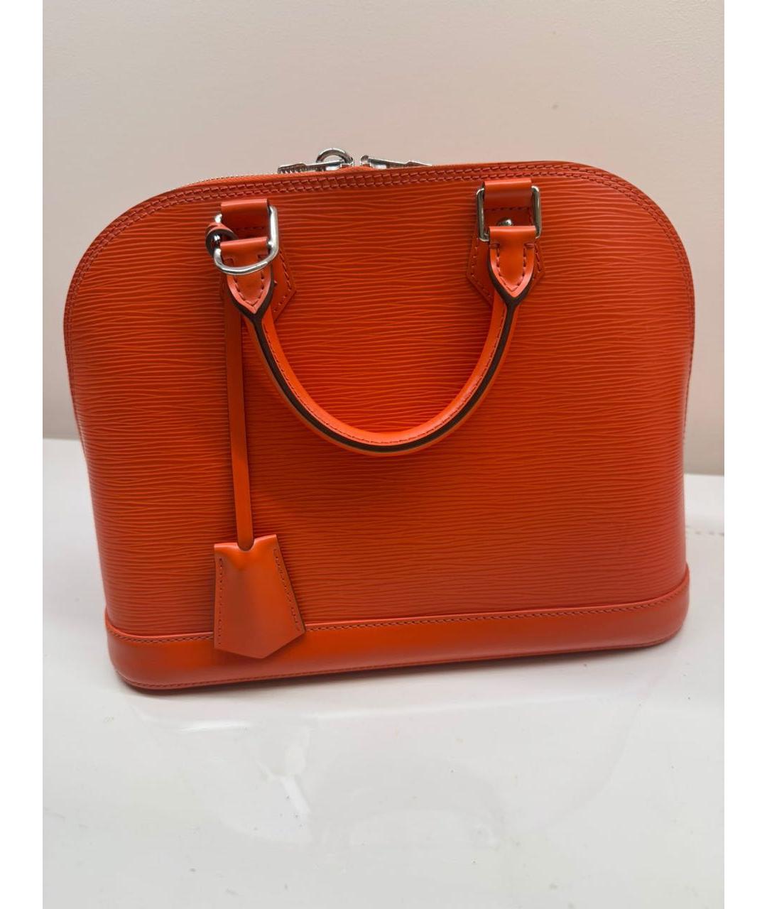 LOUIS VUITTON Оранжевая кожаная сумка с короткими ручками, фото 6