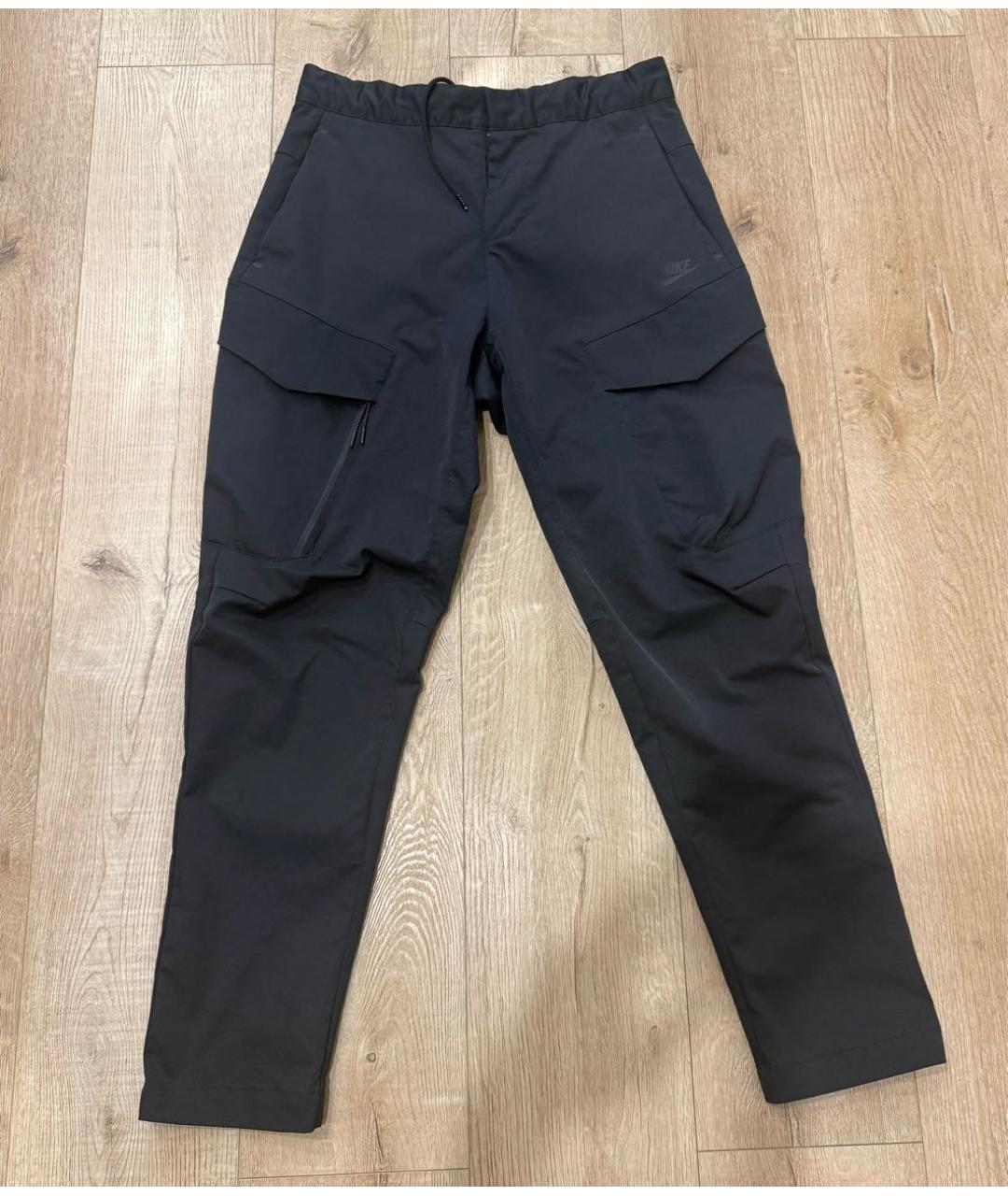 NIKE Черные полиэстеровые повседневные брюки, фото 5