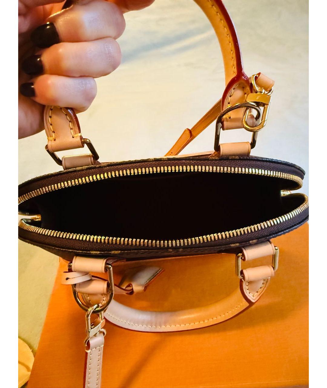 LOUIS VUITTON Коричневая кожаная сумка с короткими ручками, фото 3