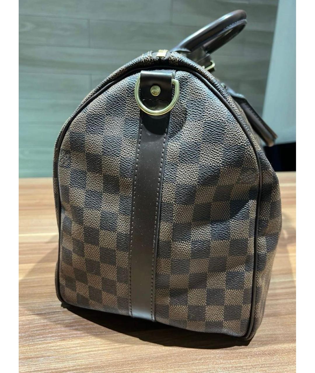LOUIS VUITTON Коричневая дорожная/спортивная сумка, фото 2