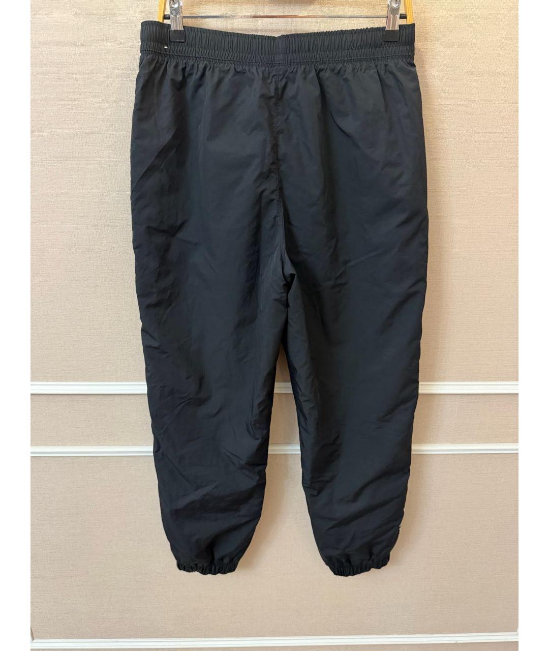 NIKE Черные полиэстеровые спортивные брюки и шорты, фото 3