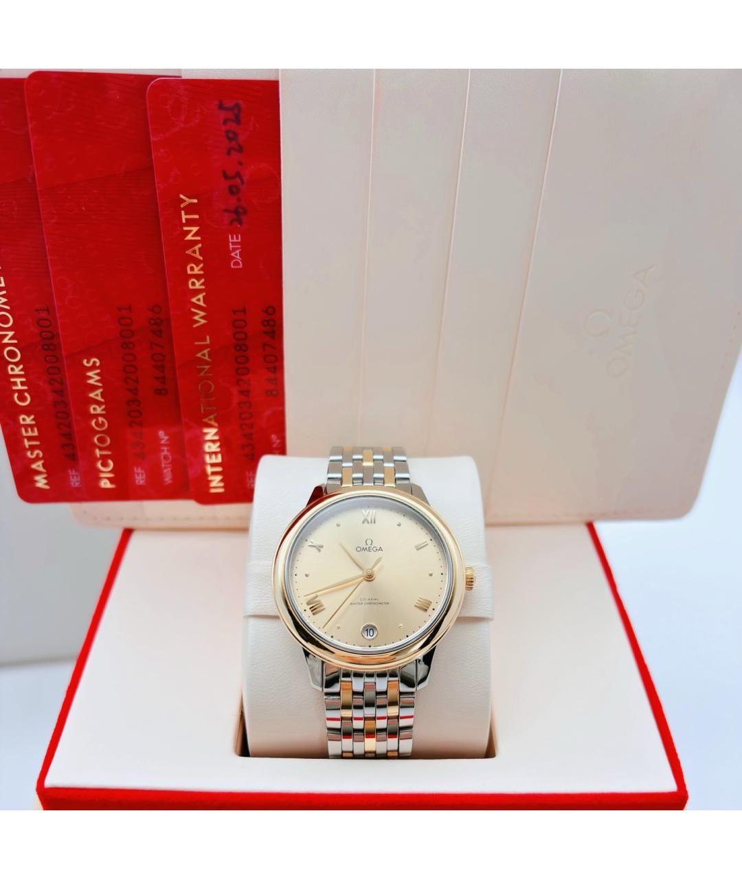 OMEGA Желтые часы из розового золота, фото 2