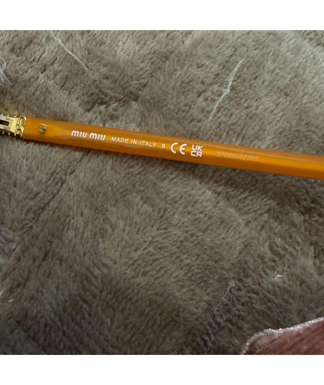 MIU MIU Оранжевое пластиковые солнцезащитные очки, фото 3