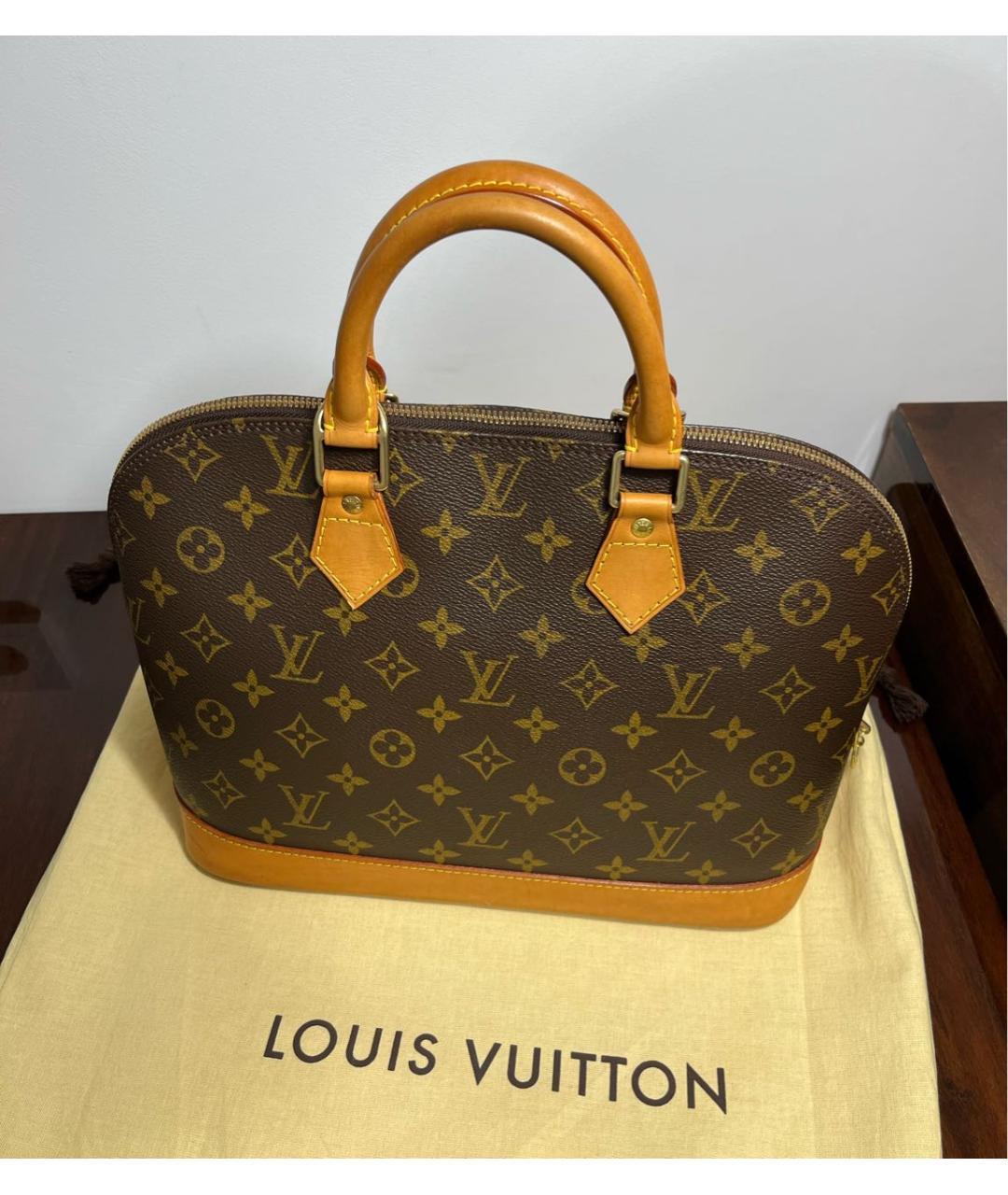 LOUIS VUITTON Коричневая кожаная сумка с короткими ручками, фото 4