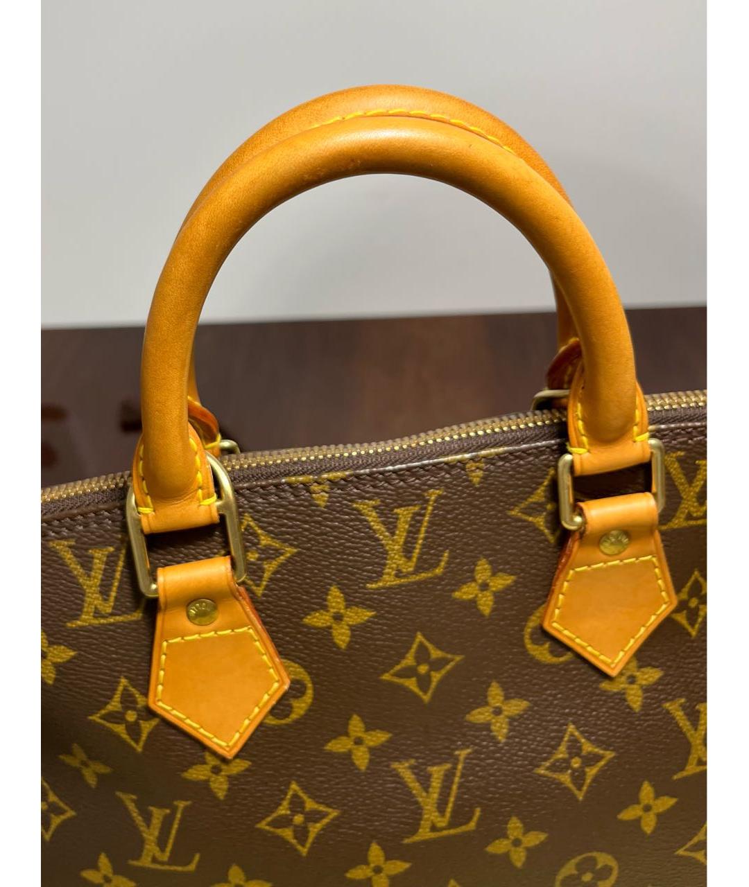 LOUIS VUITTON Коричневая кожаная сумка с короткими ручками, фото 7