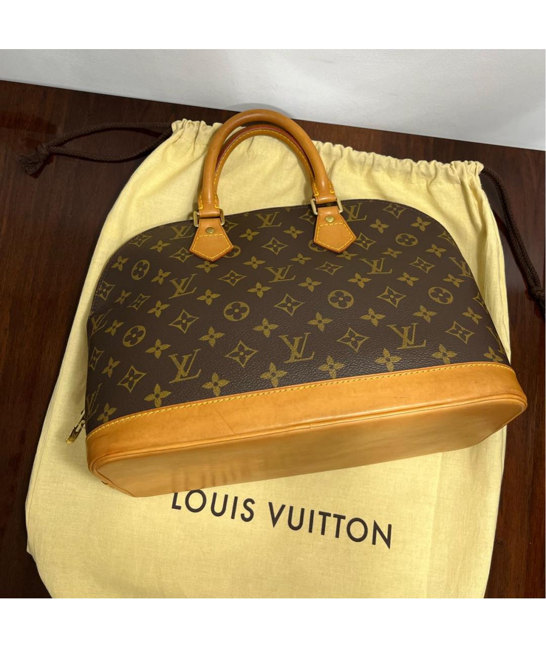LOUIS VUITTON Коричневая кожаная сумка с короткими ручками, фото 6