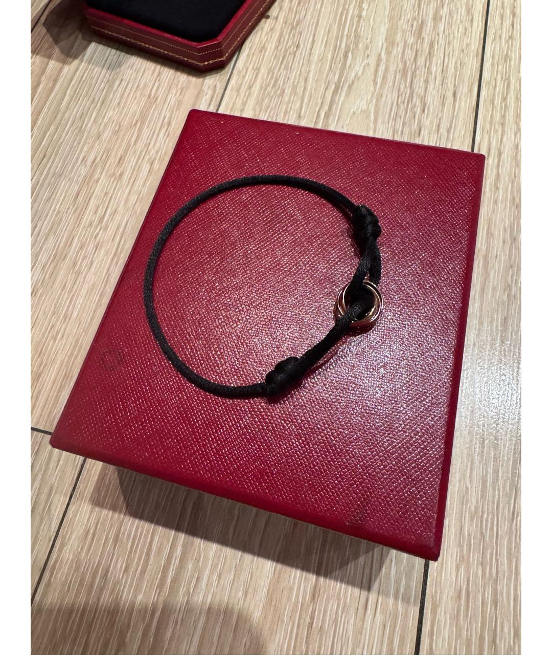 CARTIER Черный браслет из желтого золота, фото 2