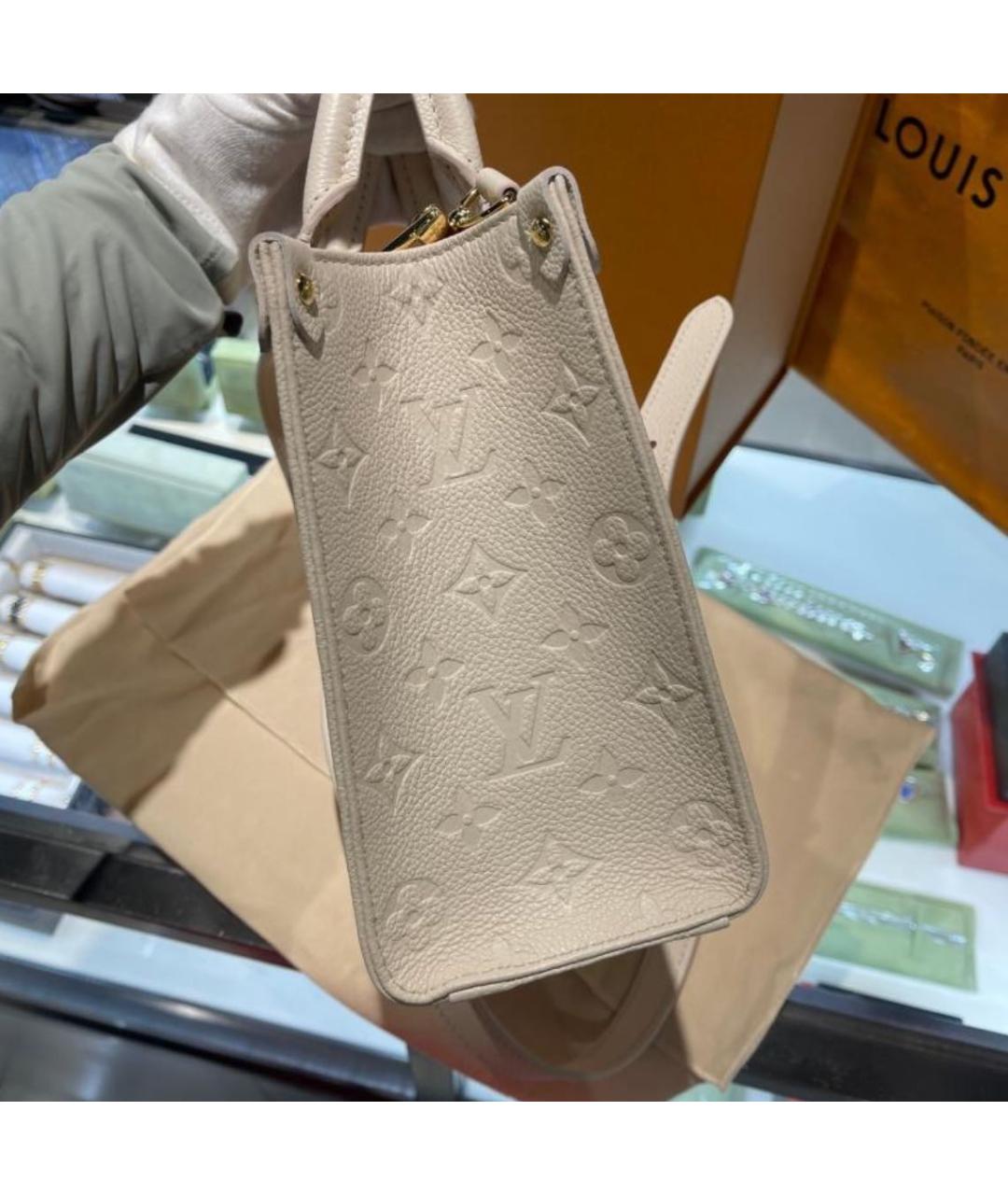 LOUIS VUITTON Бежевая кожаная сумка тоут, фото 5