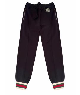 GUCCI Спортивные брюки и шорты