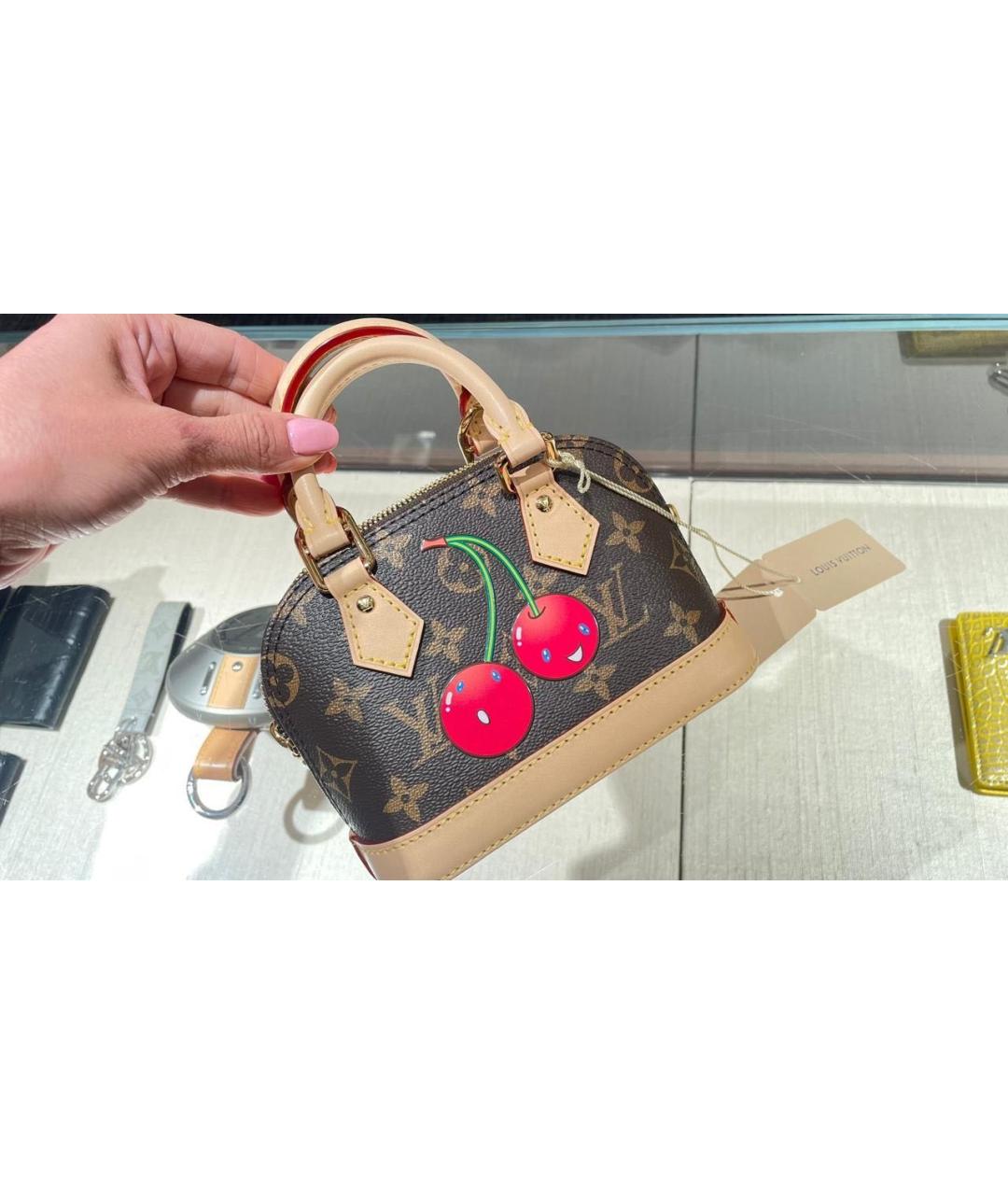 LOUIS VUITTON Коричневая кожаная сумка с короткими ручками, фото 2