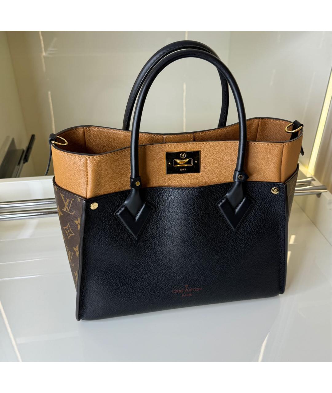 LOUIS VUITTON Черная кожаная сумка с короткими ручками, фото 9