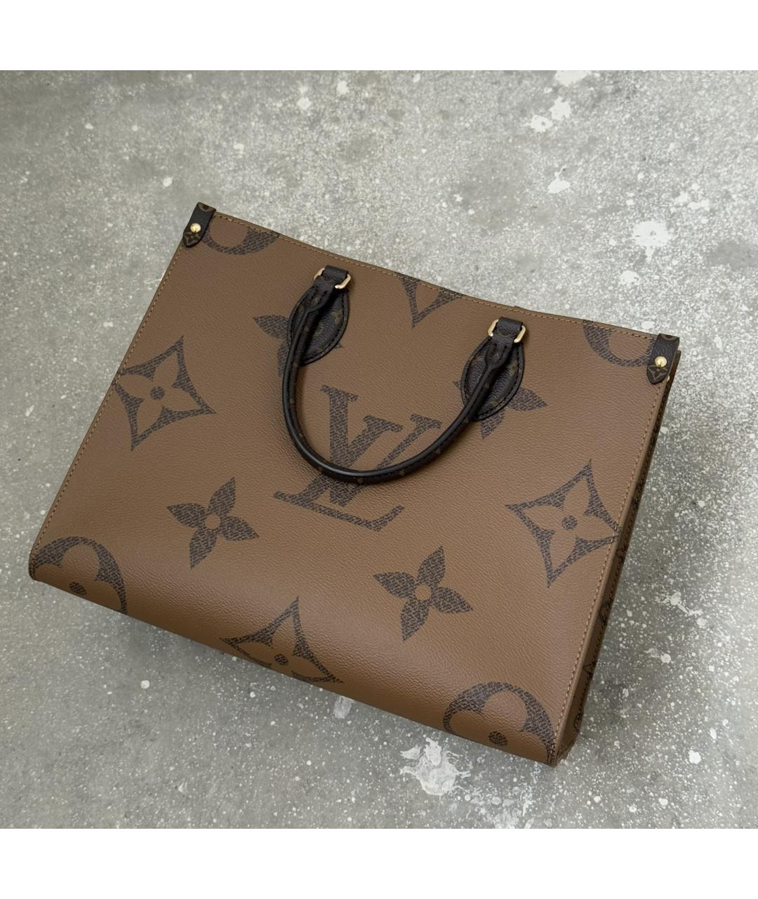 LOUIS VUITTON Коричневая кожаная сумка с короткими ручками, фото 4