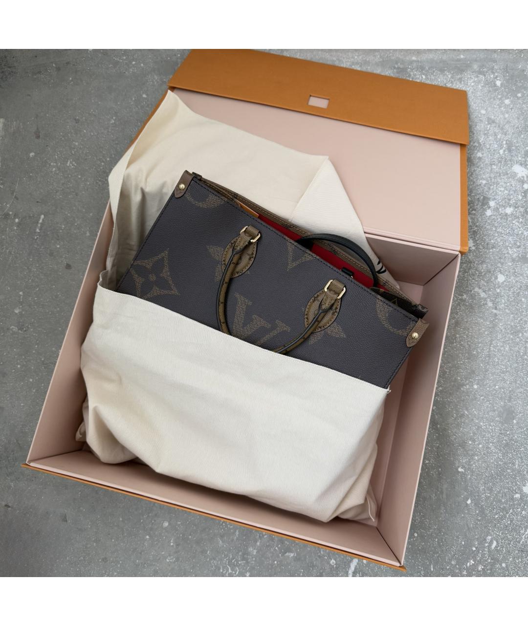 LOUIS VUITTON Коричневая кожаная сумка с короткими ручками, фото 7