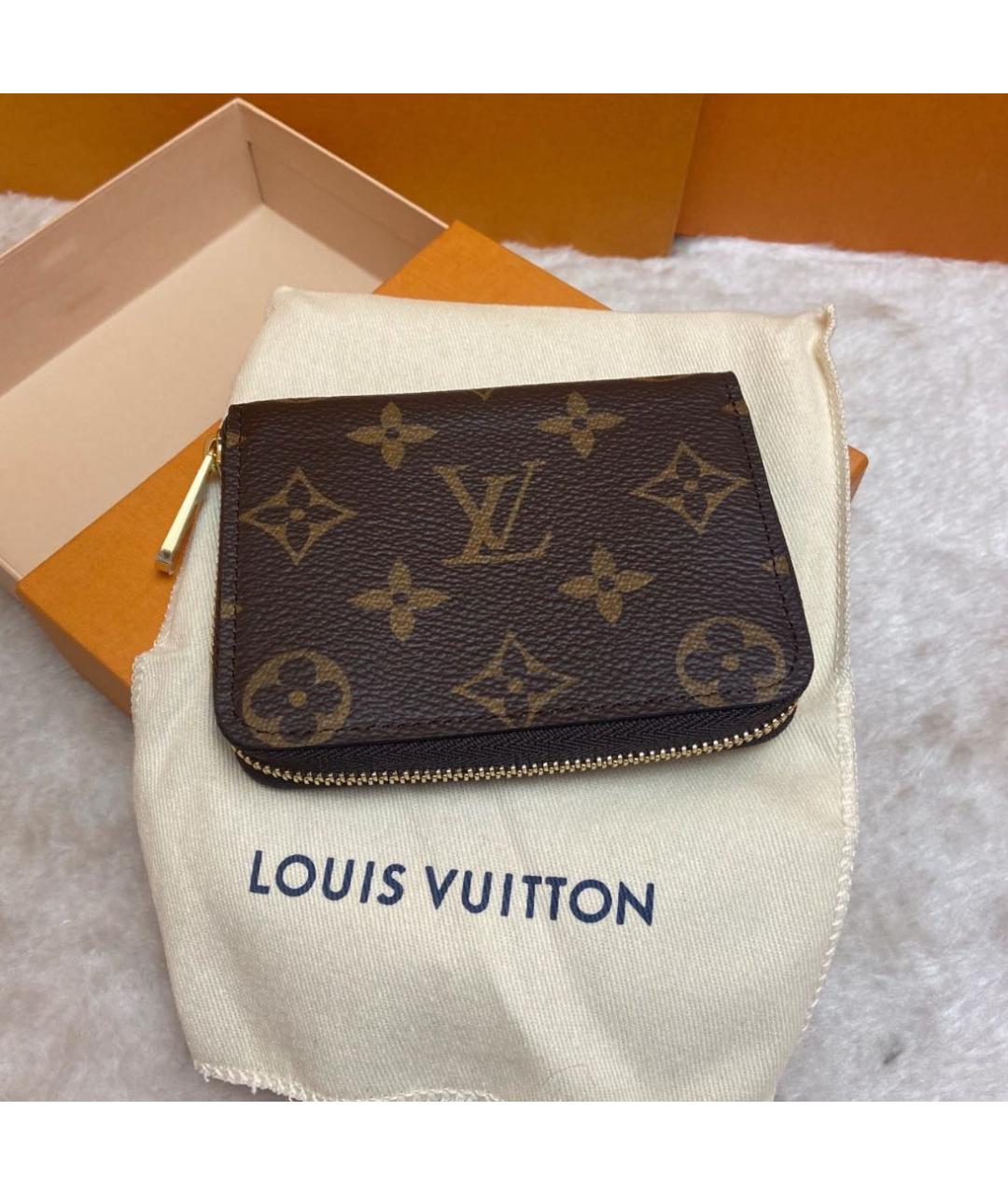 LOUIS VUITTON Коричневый кожаный кошелек, фото 2