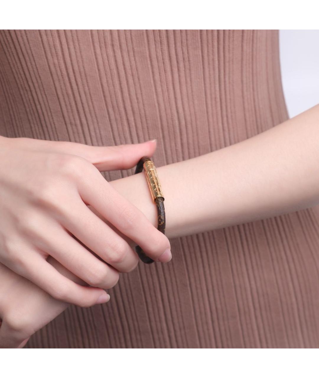 LOUIS VUITTON Коричневый латунный браслет, фото 2
