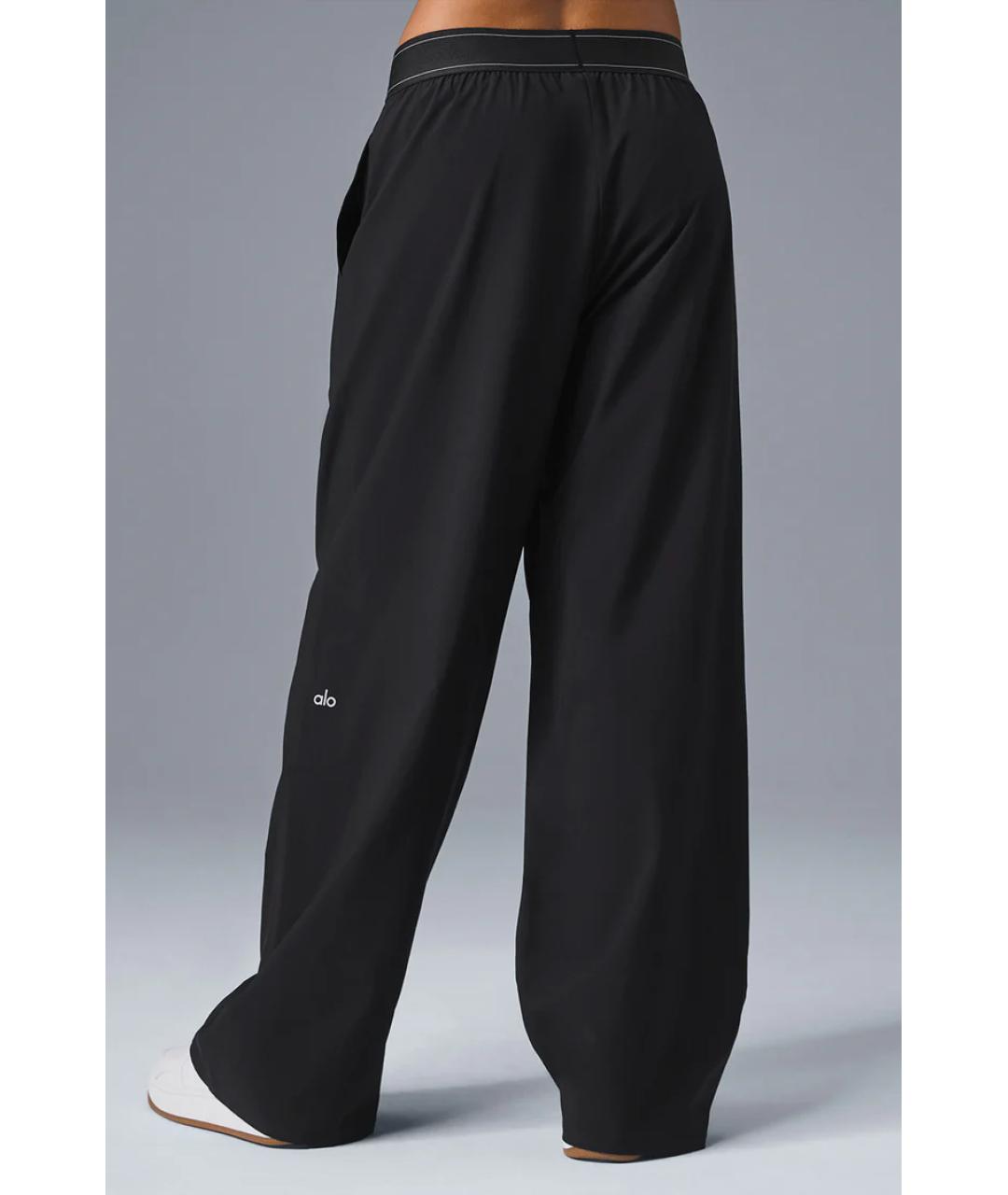 ALO YOGA Черные полиэстеровые прямые брюки, фото 3