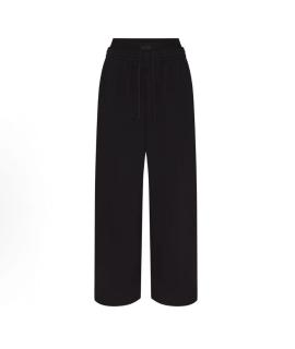 SKIMS Спортивные брюки и шорты