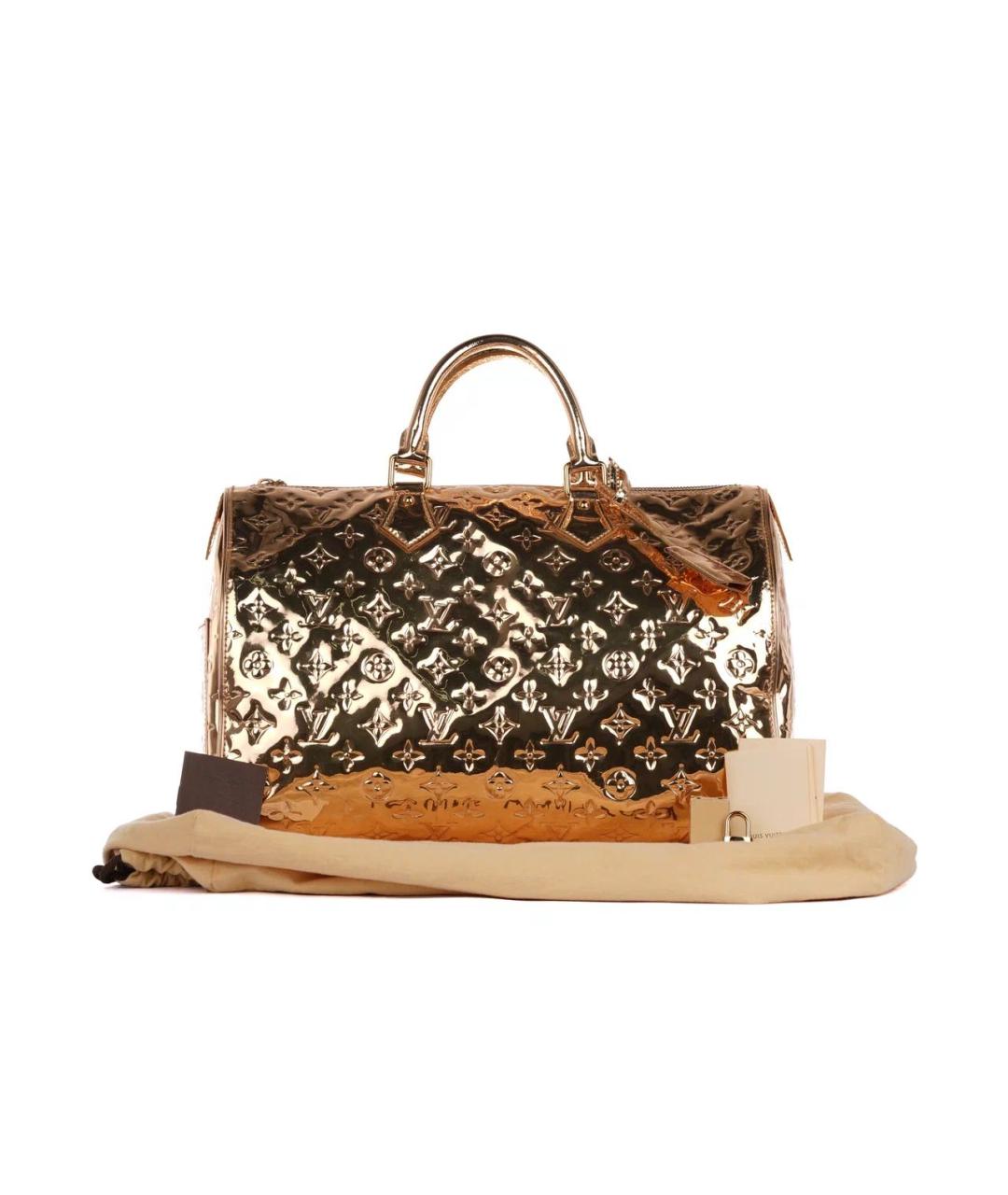 LOUIS VUITTON Золотая дорожная/спортивная сумка из лакированной кожи, фото 2