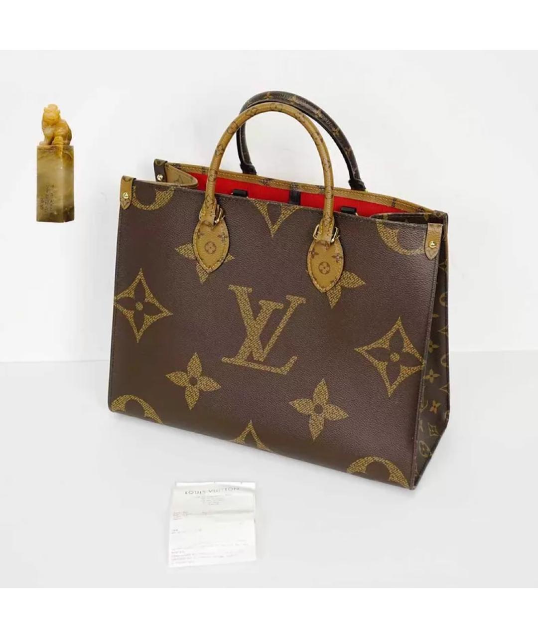 LOUIS VUITTON Коричневая кожаная сумка с короткими ручками, фото 9