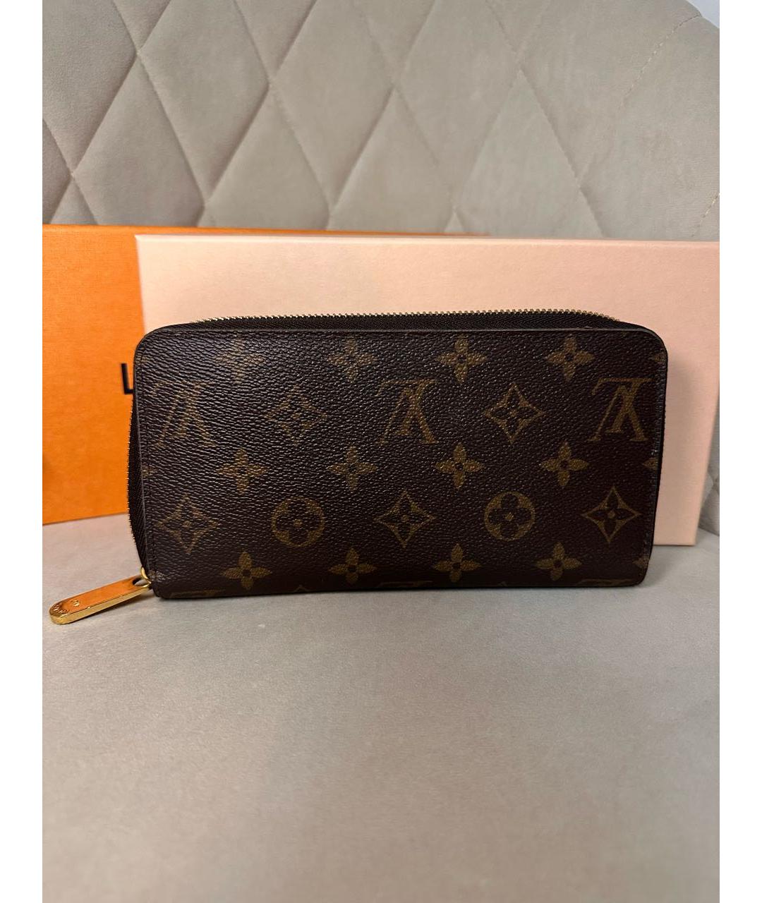 LOUIS VUITTON Коричневый кожаный кошелек, фото 3