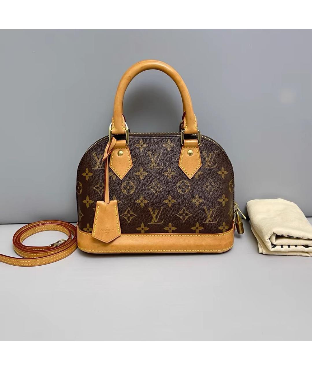 LOUIS VUITTON Коричневая кожаная сумка с короткими ручками, фото 9