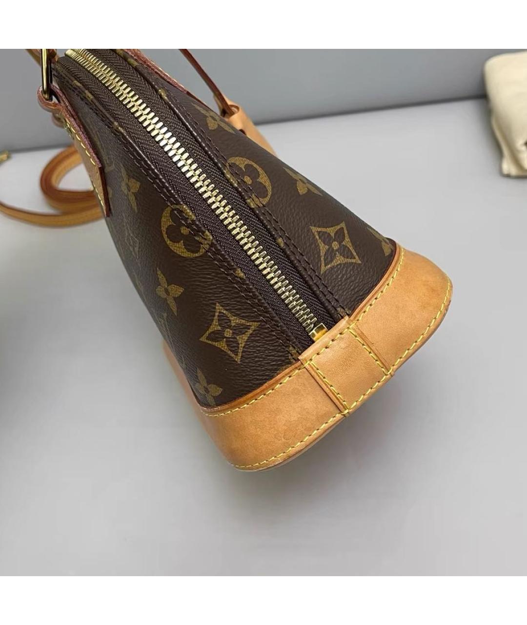 LOUIS VUITTON Коричневая кожаная сумка с короткими ручками, фото 4