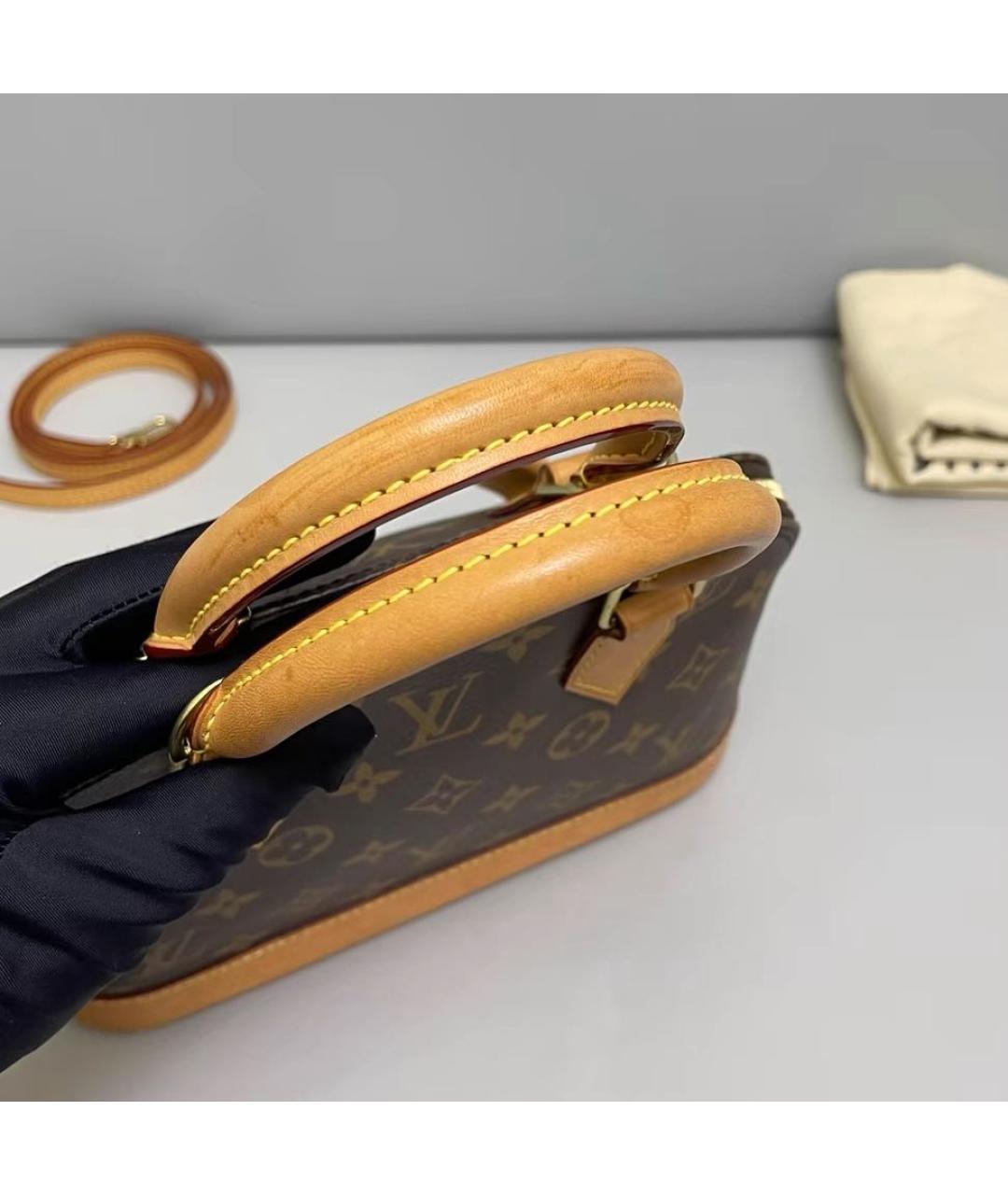 LOUIS VUITTON Коричневая кожаная сумка с короткими ручками, фото 6