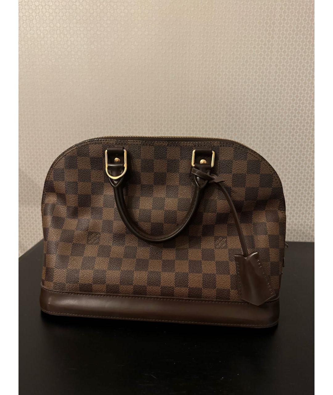 LOUIS VUITTON Коричневая кожаная сумка с короткими ручками, фото 3