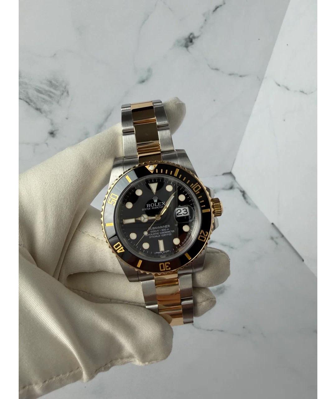 ROLEX Черные часы из желтого золота, фото 2
