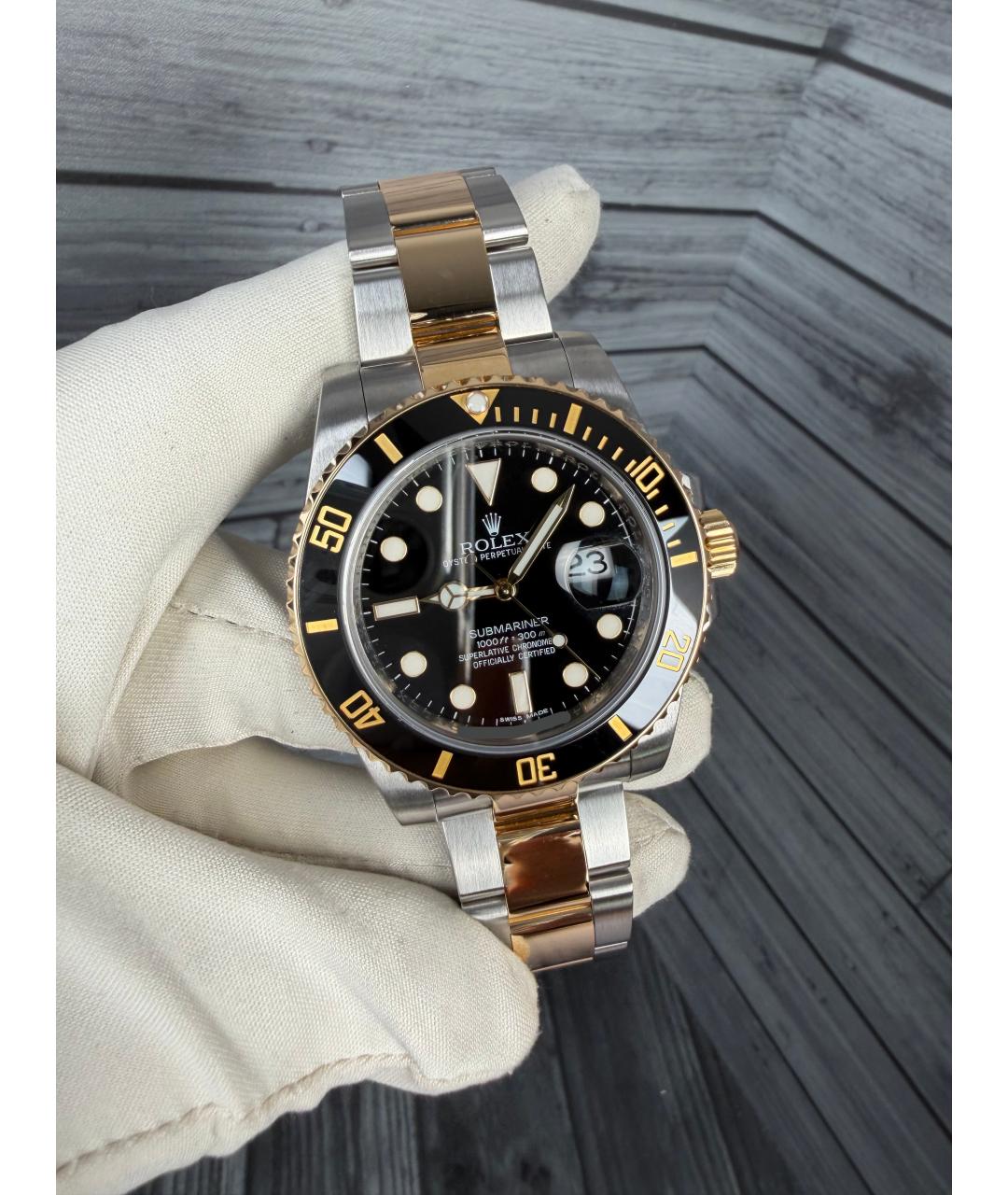 ROLEX Черные часы из желтого золота, фото 2