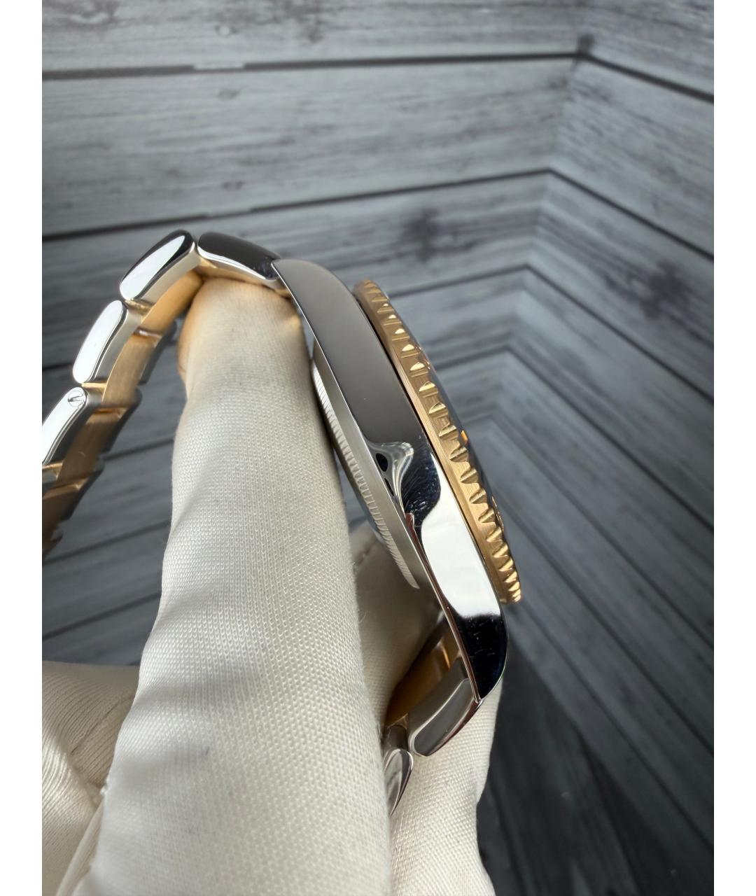 ROLEX Черные часы из желтого золота, фото 5