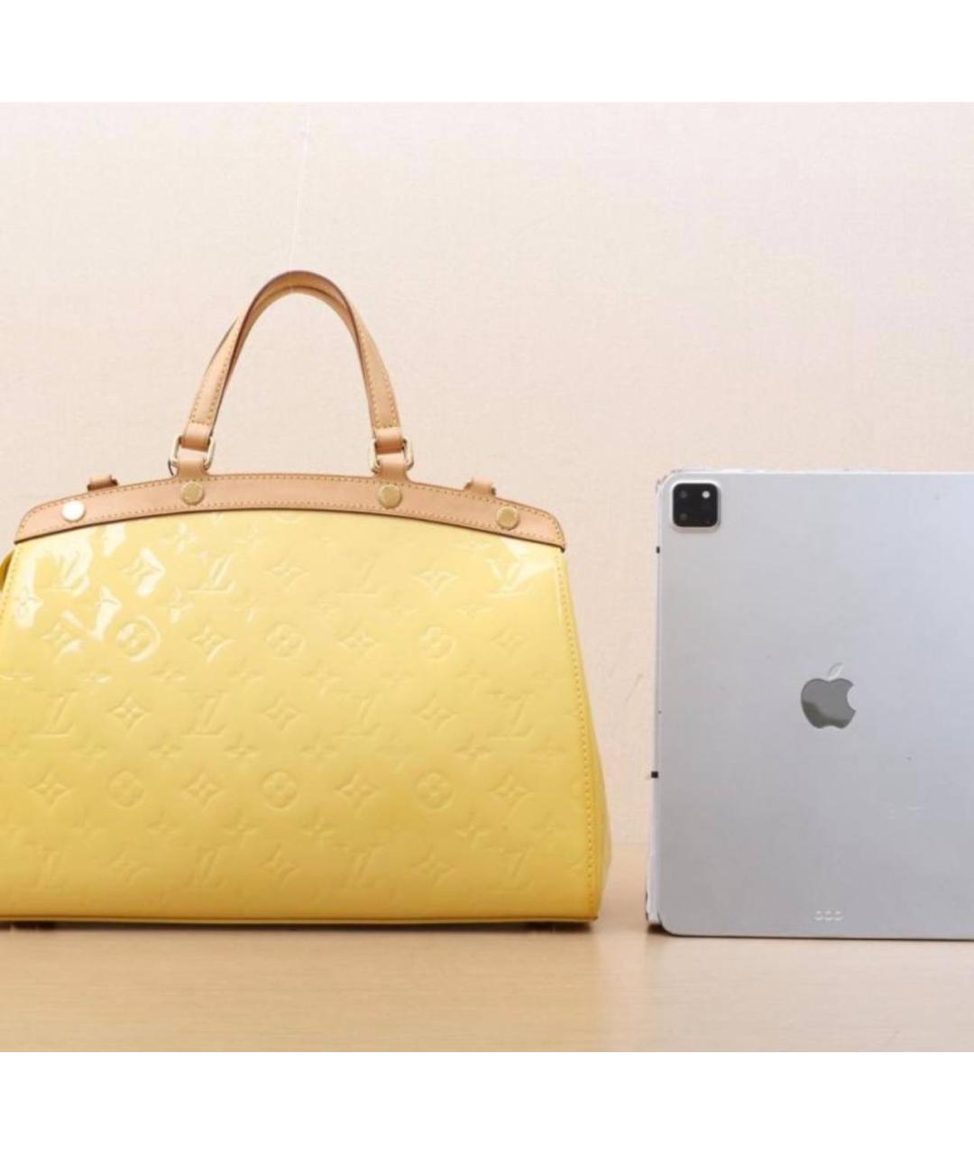 LOUIS VUITTON Желтая кожаная сумка с короткими ручками, фото 3