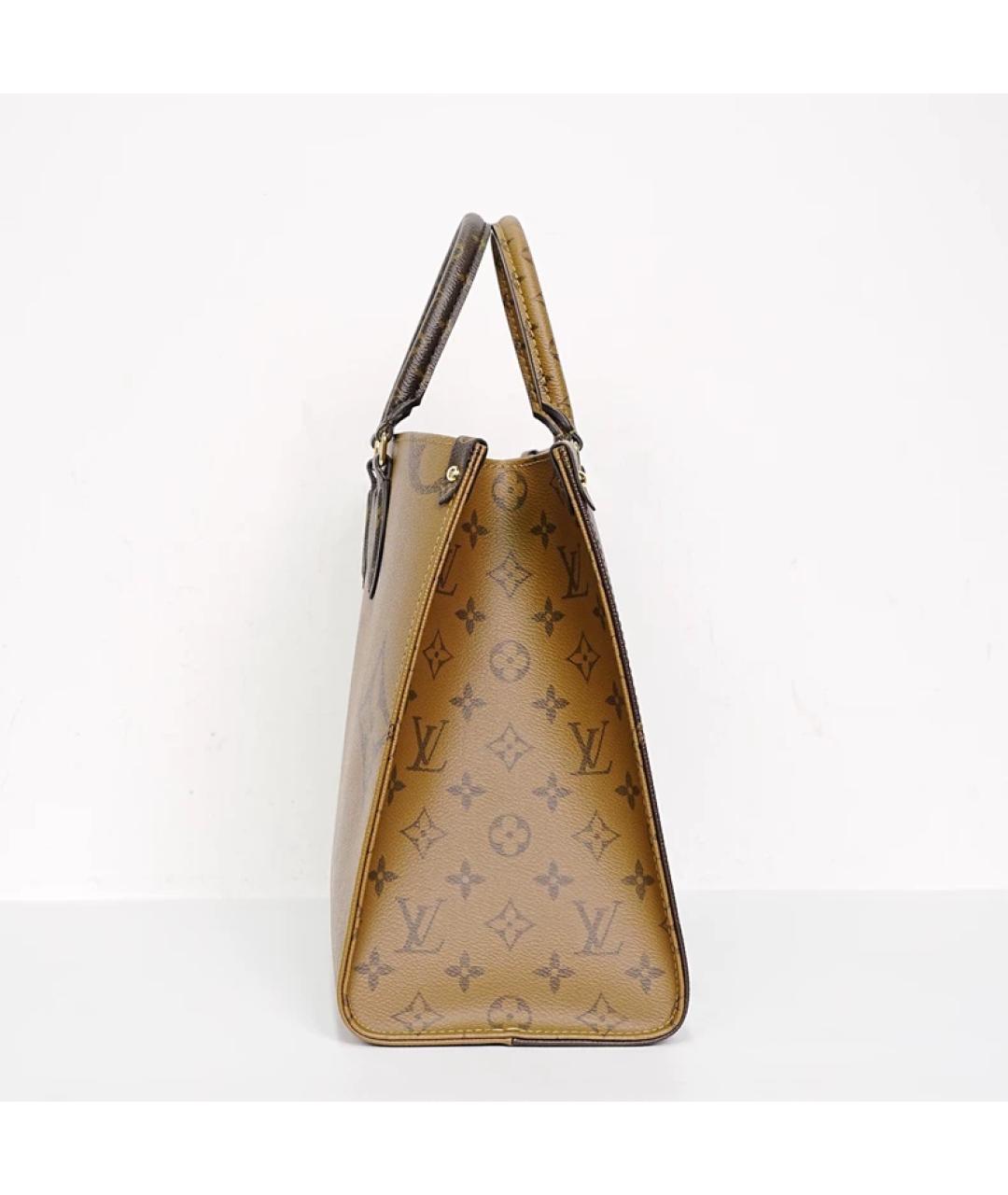 LOUIS VUITTON Коричневая кожаная сумка с короткими ручками, фото 6