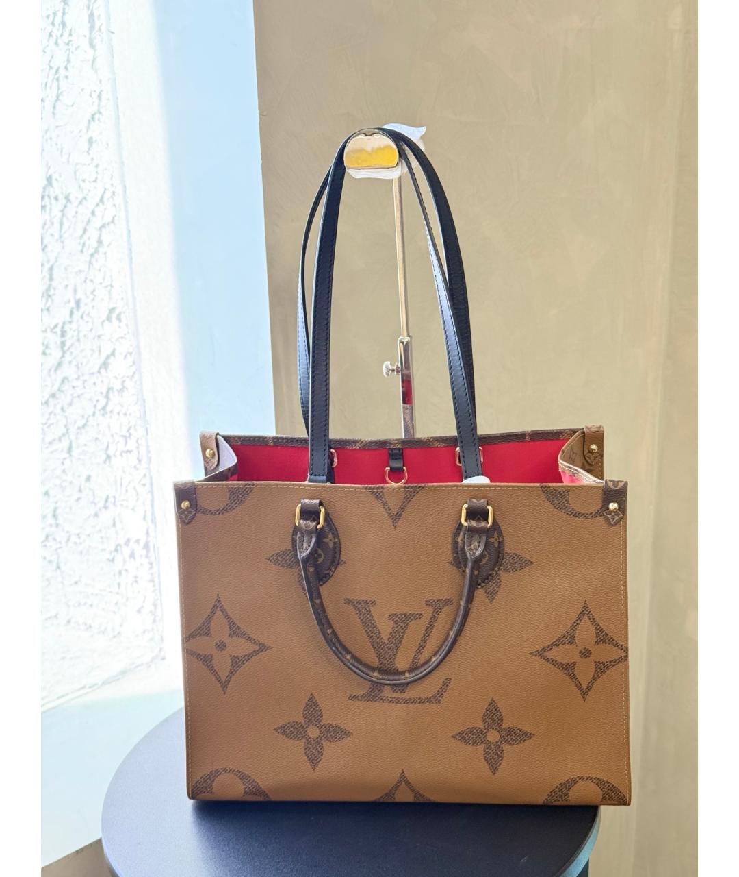 LOUIS VUITTON Коричневая сумка с короткими ручками из искусственной кожи, фото 9