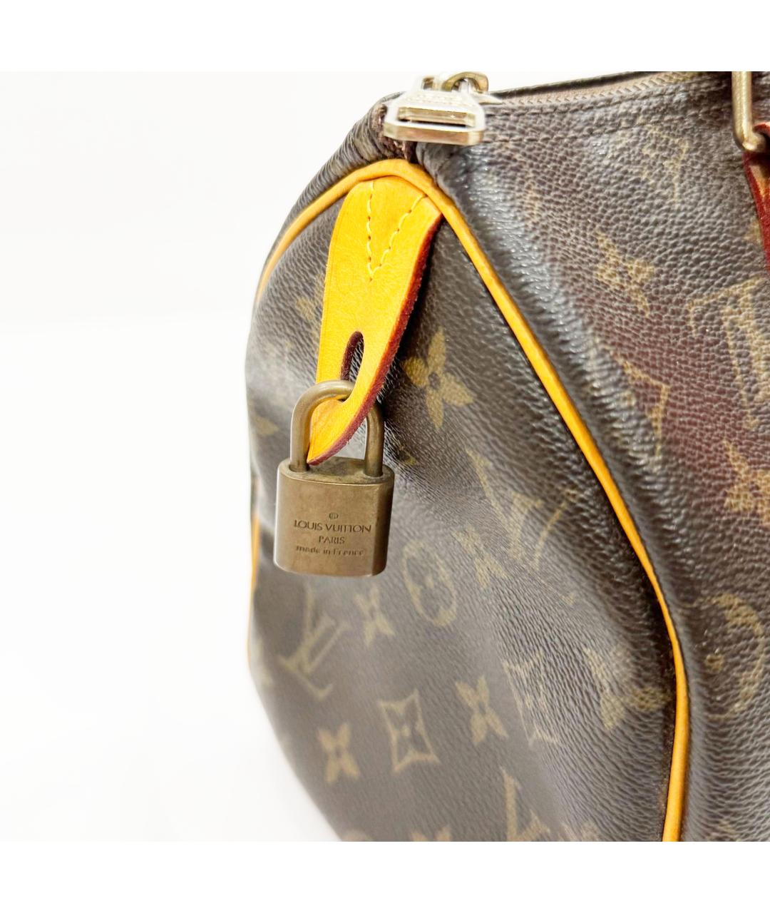 LOUIS VUITTON Коричневая кожаная сумка с короткими ручками, фото 7