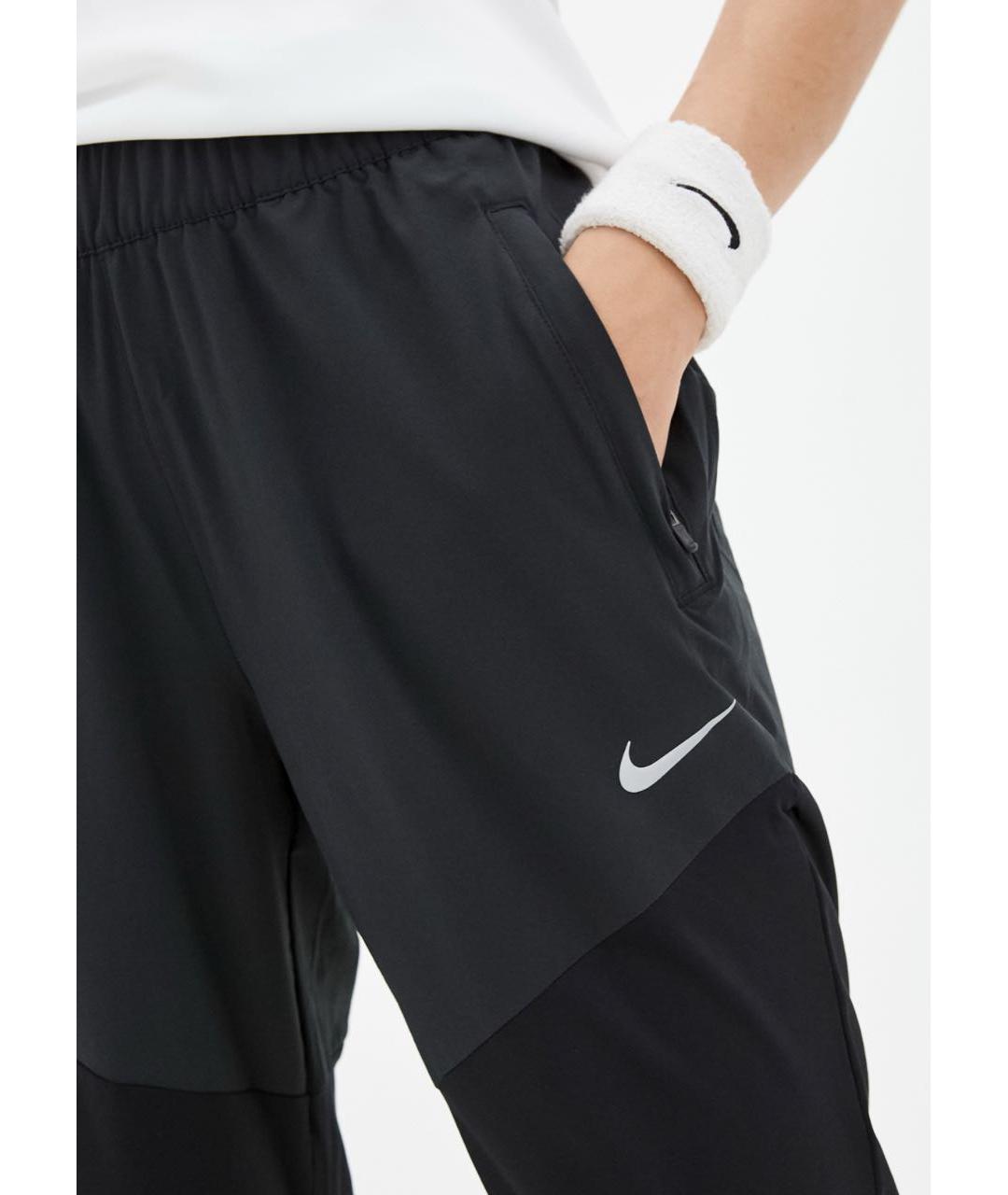 NIKE Полиэстеровые спортивные брюки и шорты, фото 2