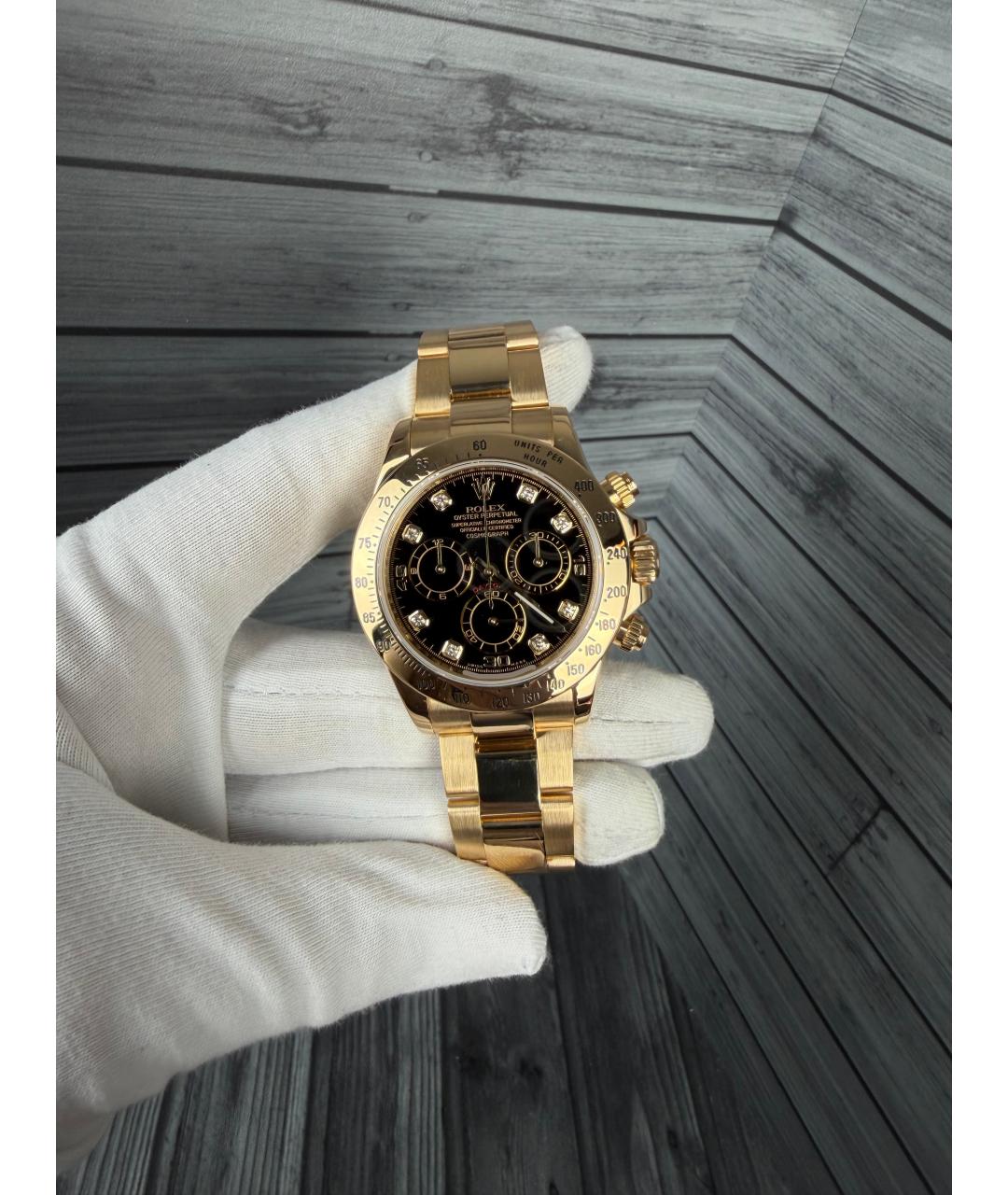 ROLEX Черные часы из желтого золота, фото 2