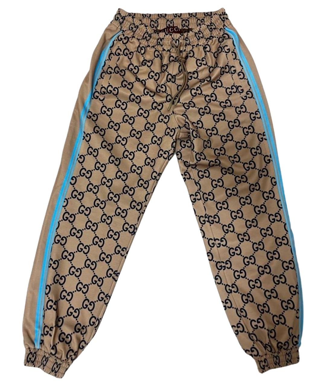 GUCCI Горчичные полиэстеровые спортивные брюки и шорты, фото 1