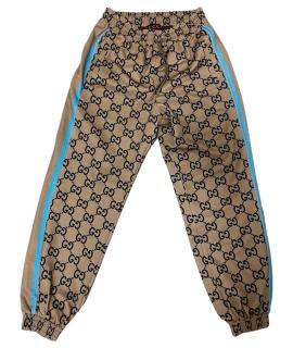 GUCCI Спортивные брюки и шорты